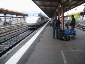 Waiting at train station during family vacation to Europe