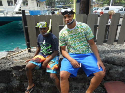 Kids preparing for snorkeling in Hawaii.