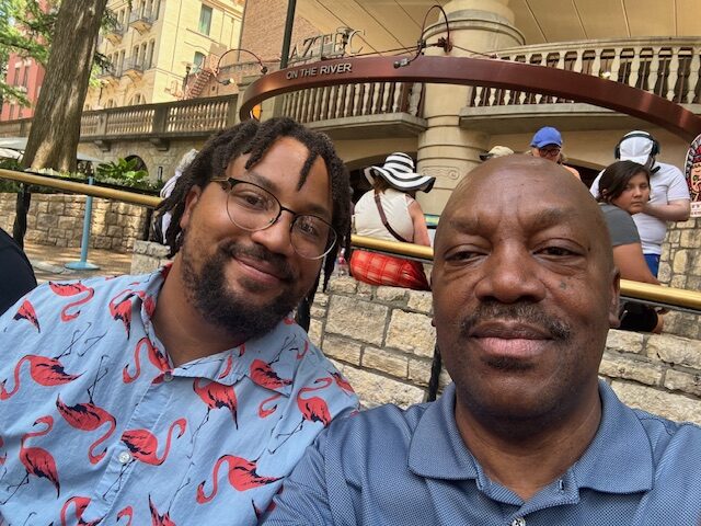 My son and I enjpying a moment during our River walk San Antonio.