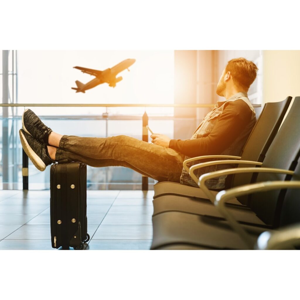 Passanger waiting in airport due to flight delay.