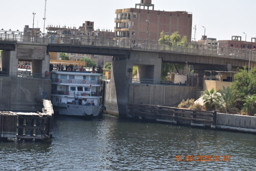 A cruise ship going through the lock on the Majestic Nile River.