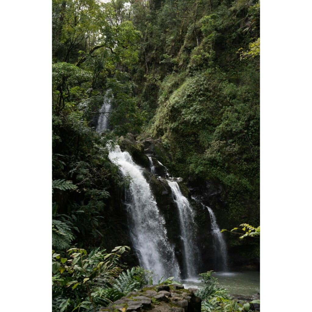 You can enjoy a waterfall during your escape for winter in Hawaii.