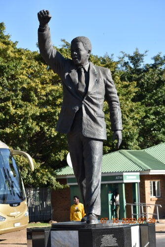 Statue of Nelson Mandela who was a strong opposition against apartheid in SOWETO South Africa. 