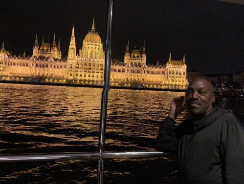 The parliament building at night is a beautiful sight during any Danube River cruise.