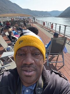 Enjoying the view from the upper deck during my Rhine getaway.